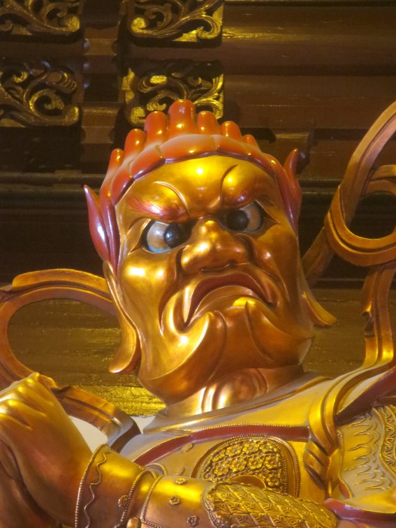 Goofy faced statue in Shanghai
