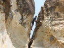 Beau rock climbing at sawarna