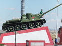 Boy riding tank