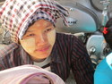 Burmese woman with traditional face painting