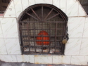 Caged orange blob
