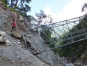 Collapsed bridge on the way to the waterfall
