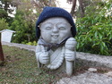 Dressed up stone statue