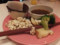 Yes the cup on the left is full of chocolate and yes I dipped everything on the plate in it including the broccoli.