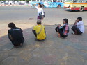 Four guys in asian crouch