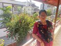 Ganga Bahadur's wife on their balcony