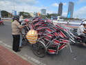 Lots of chairs on a tricycle