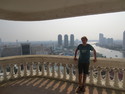 Me on balcony on on middle floor of abandon skyscraper