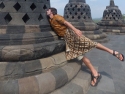 Me reaching in to touch a lucky buddha