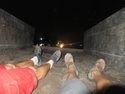 Miguel and i in dump truck at night hitchhiking to surabaya