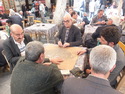 Old men playing dominos