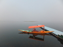 Orange boat on blue port