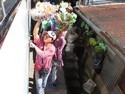 People selling things at bus stop