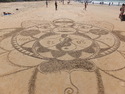 Sand mandala destine to be destroyed by the tide