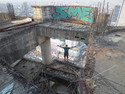 Standing on the edge of glory and danger in an abdonon skyscraper