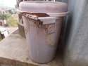 Stitched up trash can