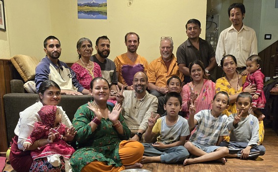 Tony and me with Aabhash's family after our Tika-day momo dinner