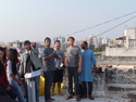 Us flying kites from the roof