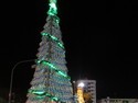 A Christmas tree made out of water bottles