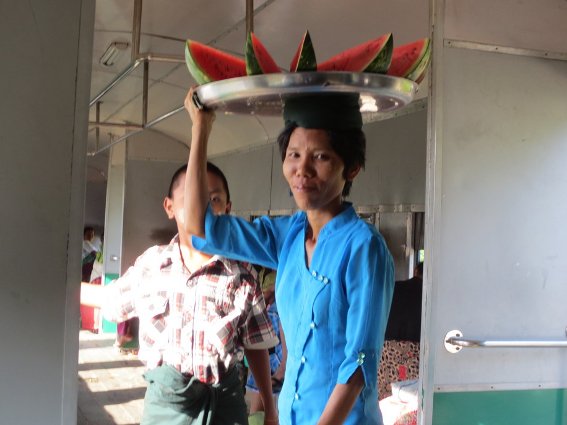 Woman selling watermelon on The Circular Train in Yangon