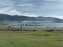 White lake with cairns